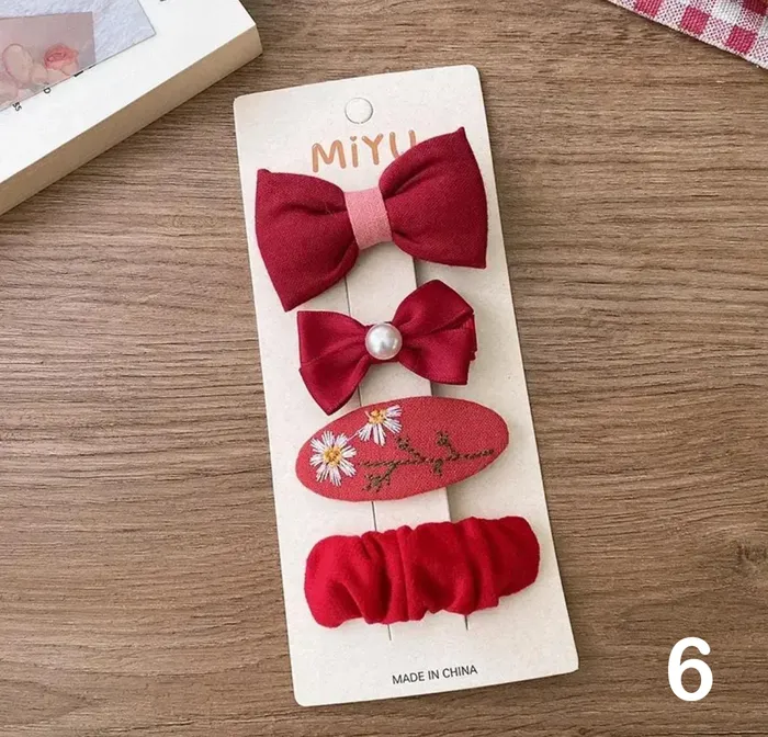 مجموعه من اربع قطع حباسات للشعر