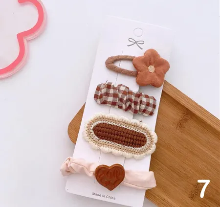 مجموعه من اربع قطع حباسات للشعر