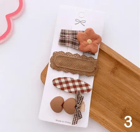 مجموعه من اربع قطع حباسات للشعر