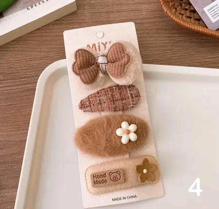 مجموعه من اربع قطع حباسات للشعر