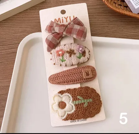 مجموعه من اربع قطع حباسات للشعر