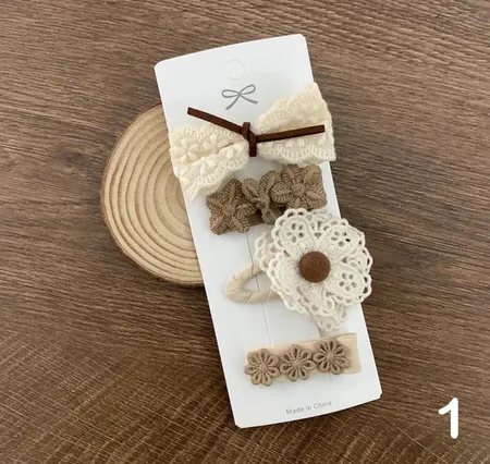 مجموعه من اربع قطع حباسات للشعر