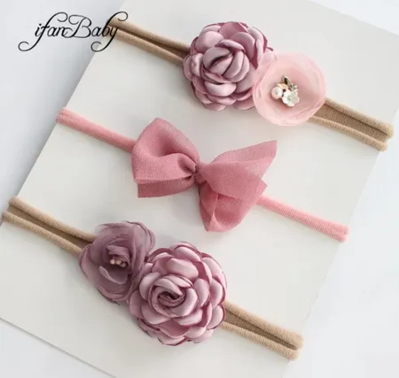 ربطة شعر باللون بنفسجي-زهري HANDEMADE