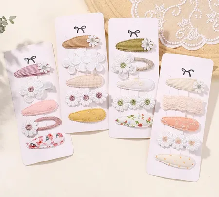 مجموعه من خمس قطع حباسات للشعر